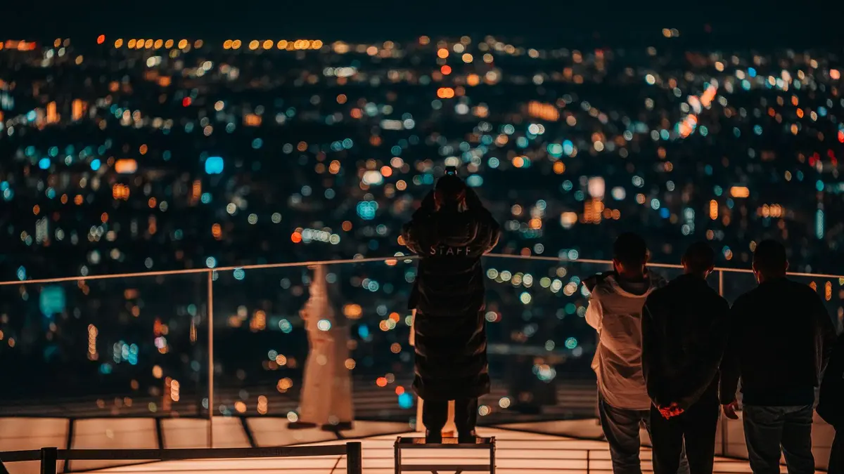 Neon-lit Shinjuku streets at night in Tokyo