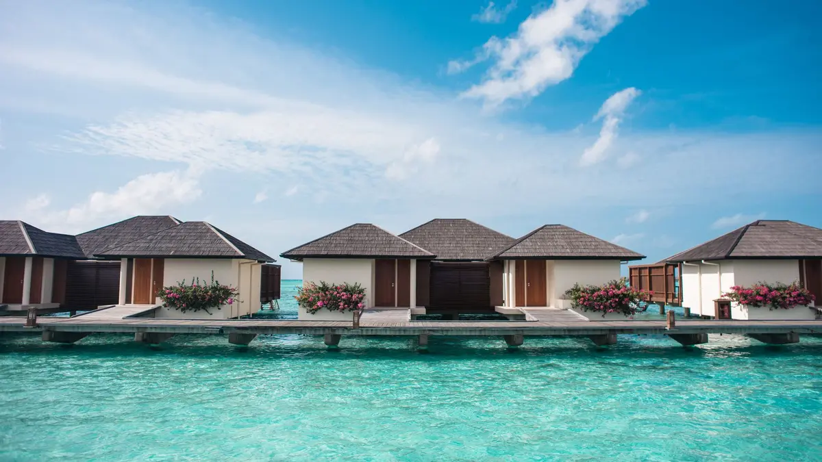 Crystal clear water and overwater bungalows in the Maldives