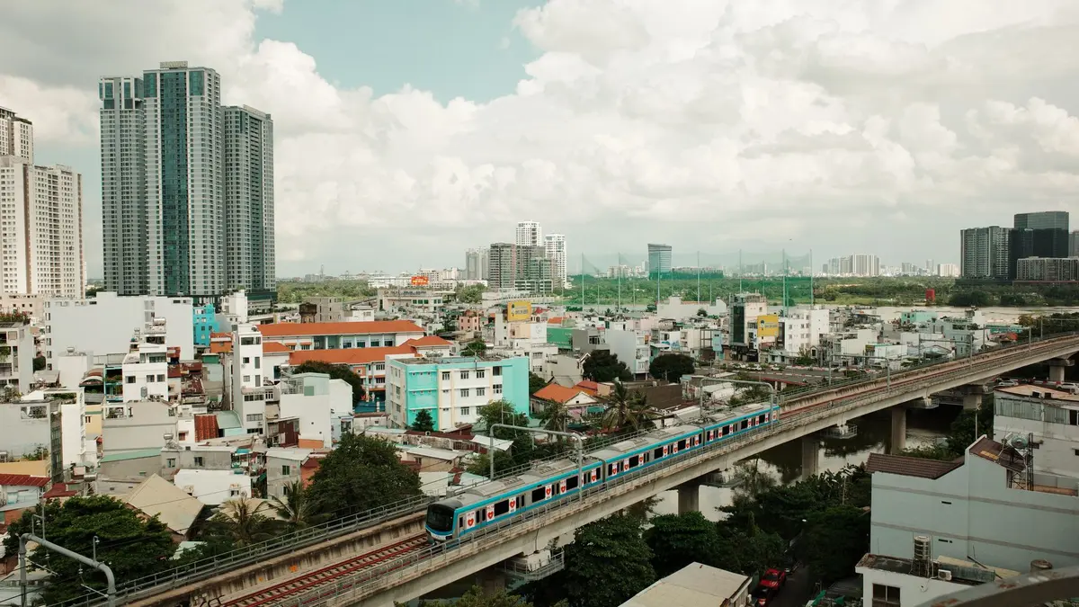 Vietnamese train crossing Hai Van Pass with ocean views